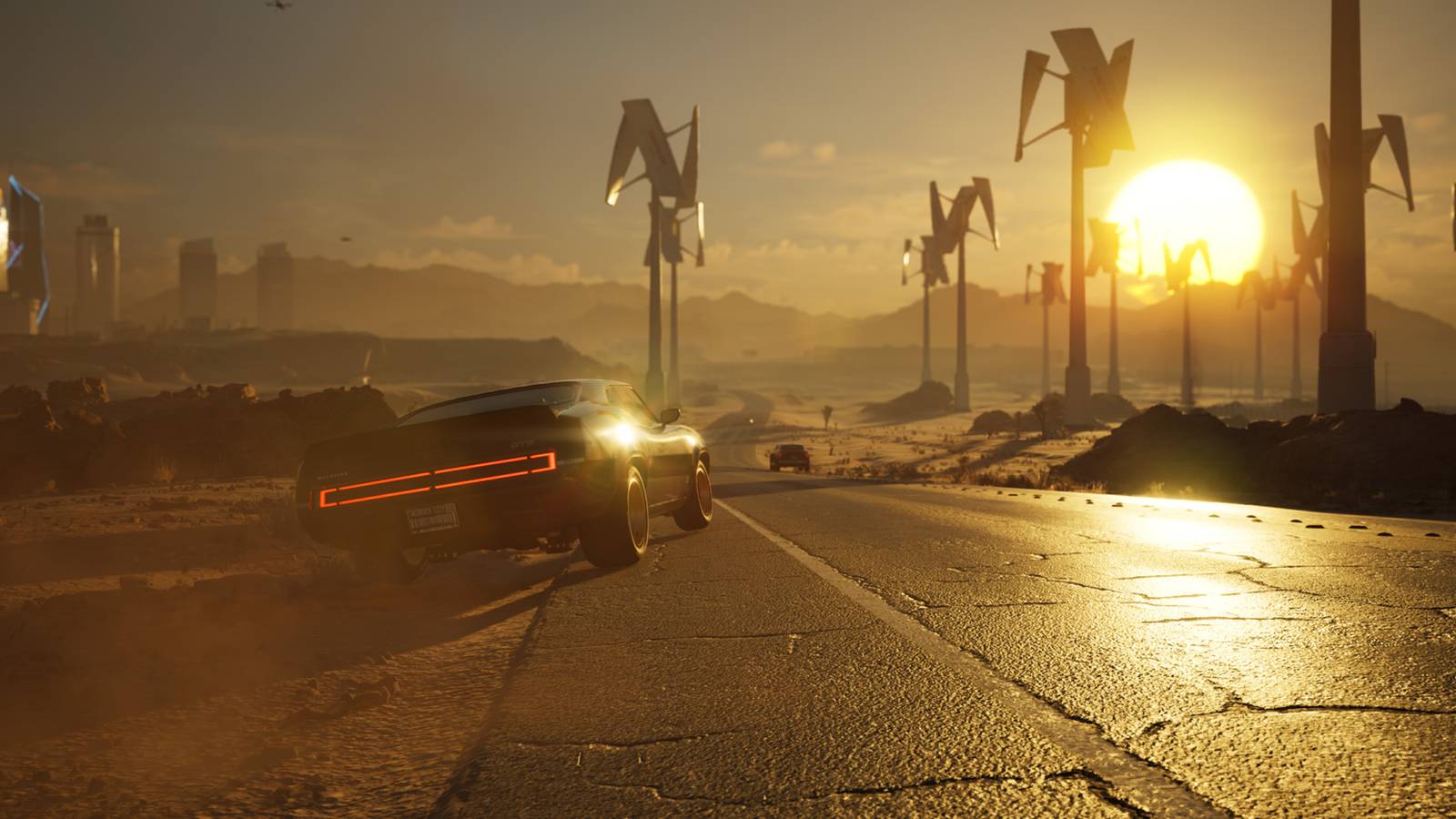 MindsEye promo screenshot car driving down Redrock desert road toward sunset chase