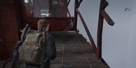 abby crossing skyscraper bridge