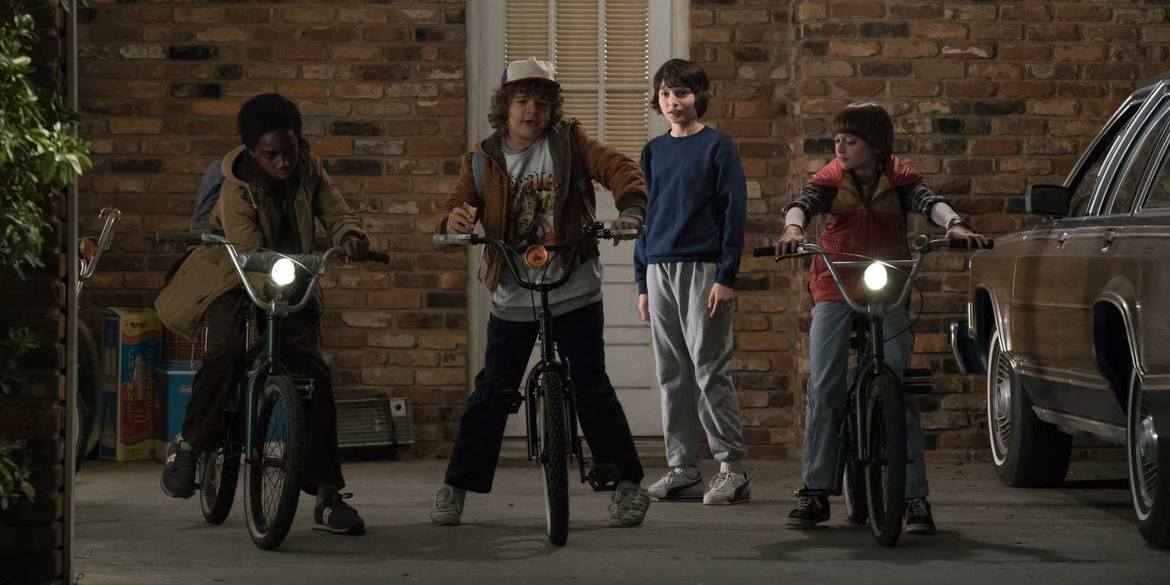 Will, Mike, Dustin, and Lucas in Stranger Things season 1 Episode 1