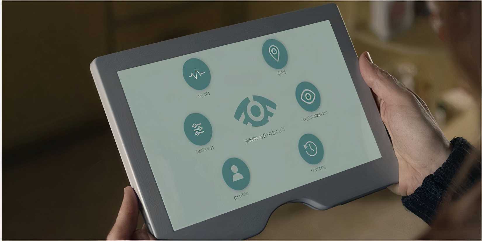 Hands holding a tablet displaying various monitoring options like GPS and vital signs.