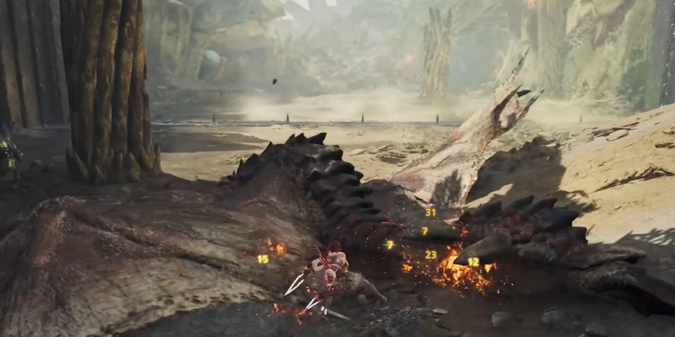 Monster Hunter Wilds dual blades attacking downed enemy