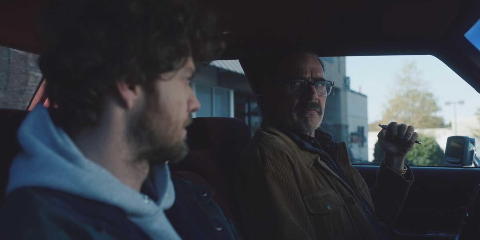 Simon (Jack Quaid) and Ed (Jeffrey Dean Morgan) in Neighborhood Watch