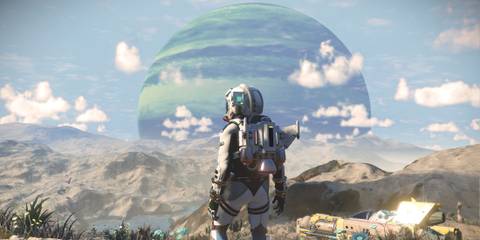 The Player standing on a mountainous planet in No Man's Sky