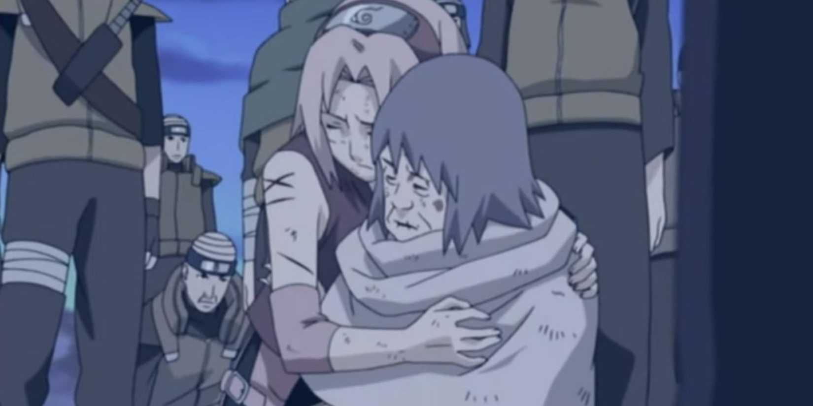 Sakura holds Chiyo's lifeless body.