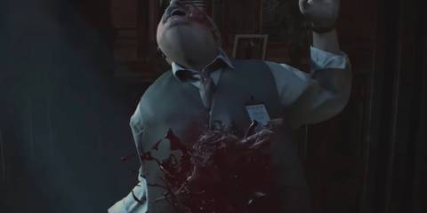 Chief Irons with a monster bursting from his chest Resident Evil 2 Remake