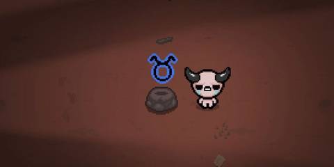 Isaac standing next to the taurus planetarium item