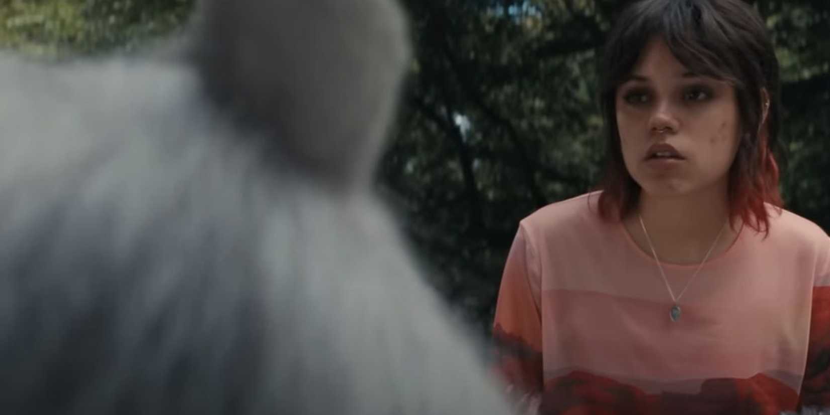 Ridley (Jenna Ortega) talking to a unicorn in Death of a Unicorn