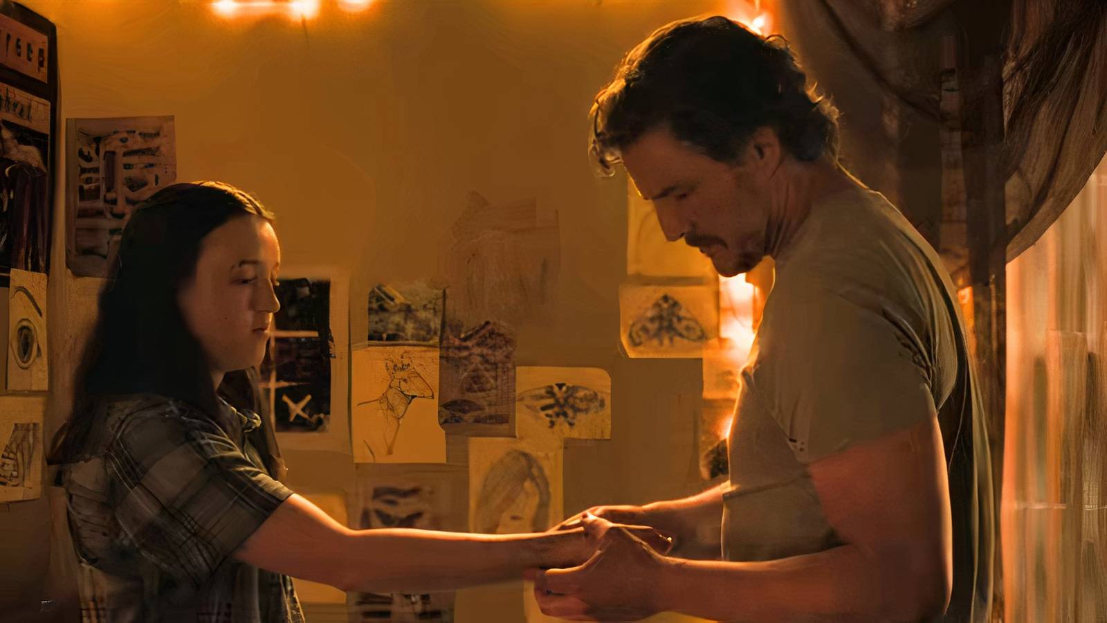 Joel touching Ellie's arm 