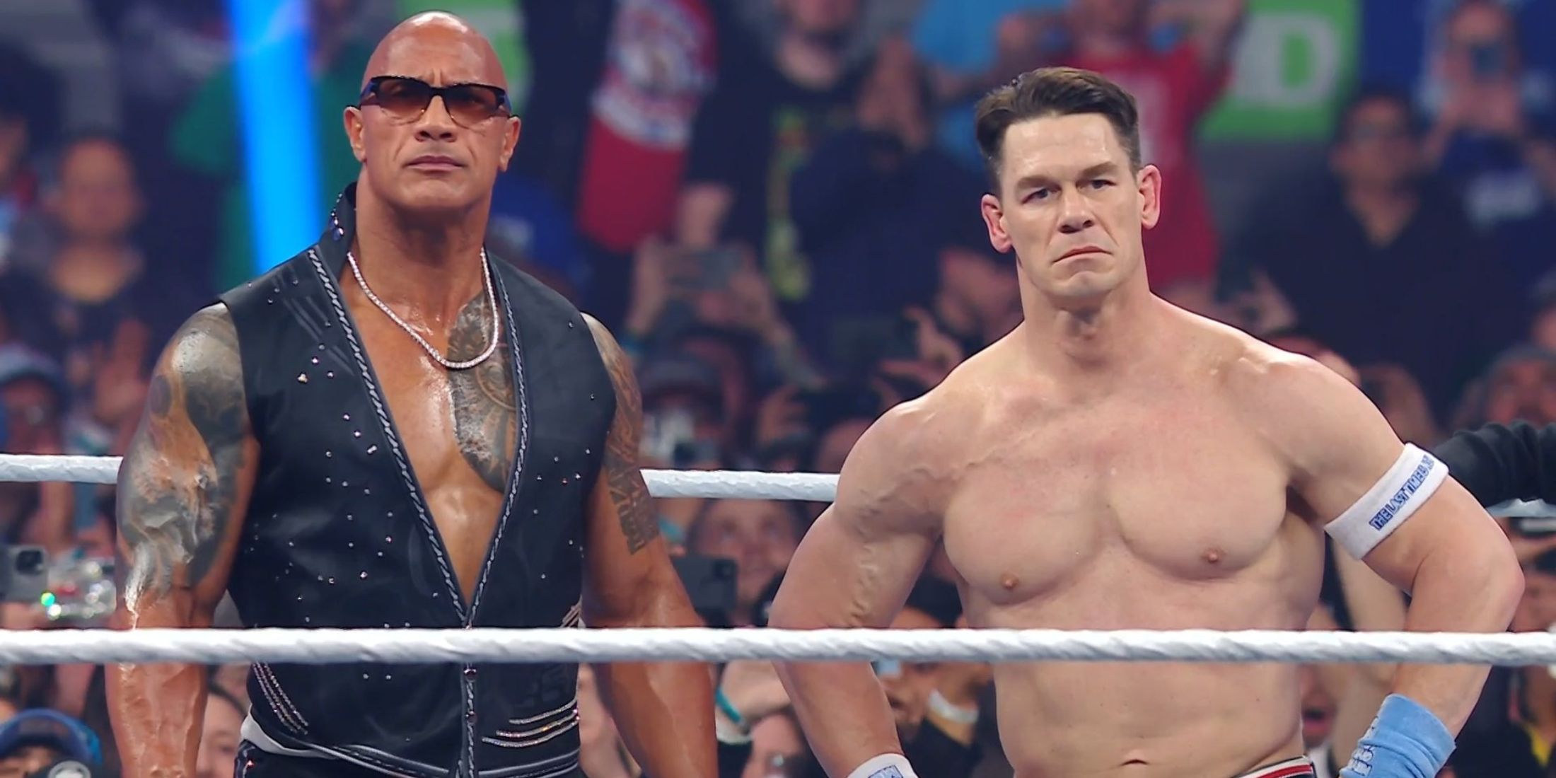 The Rock and John Cena standing side-by-side at WWE Elimination Chamber 2025