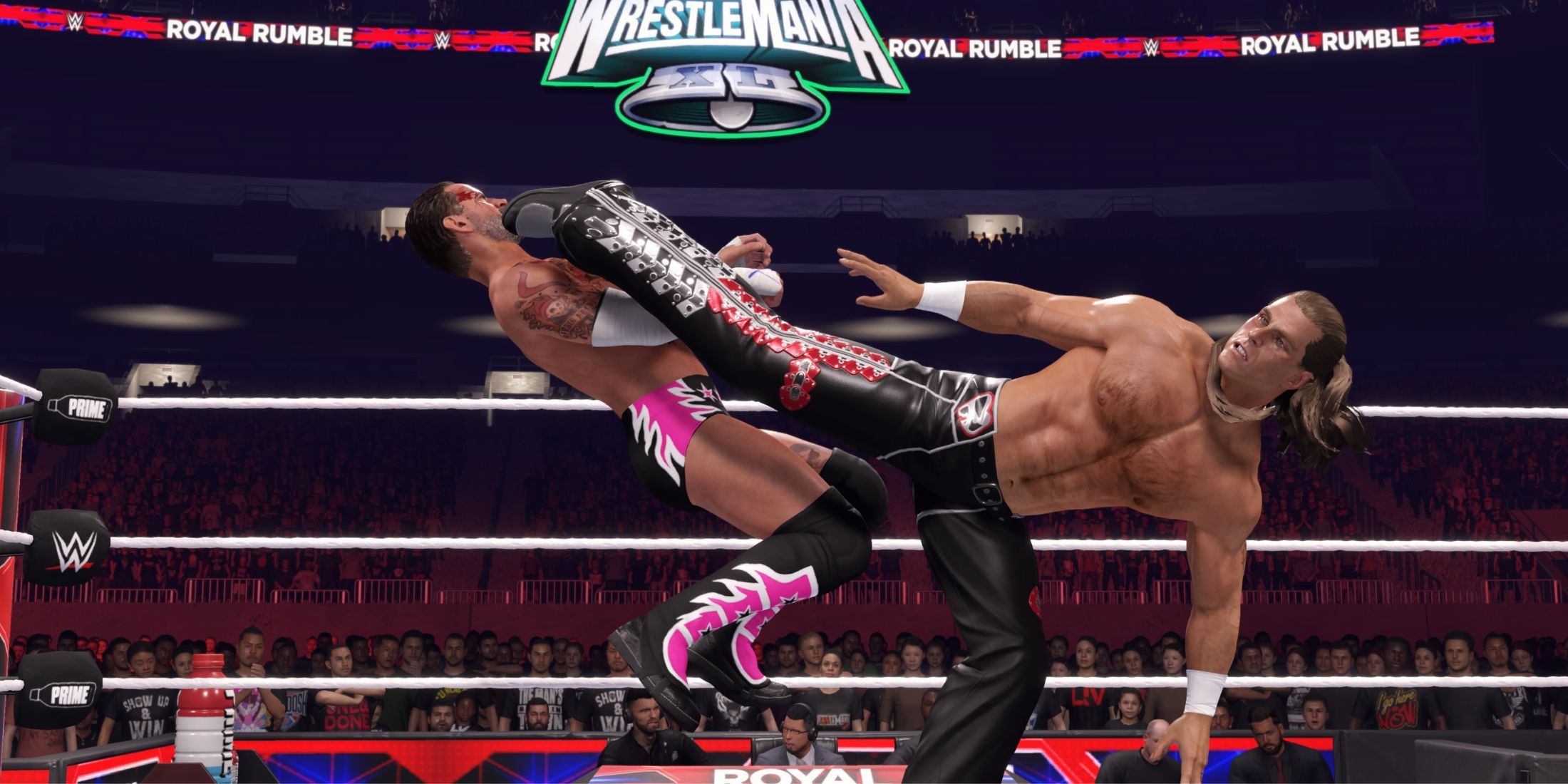 Shawn Michaels performing a Sweet Chin Music on CM Punk in WWE 2K25