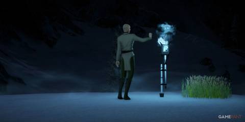 Solas lighting a torch with magic in Dragon Age: Inquisition