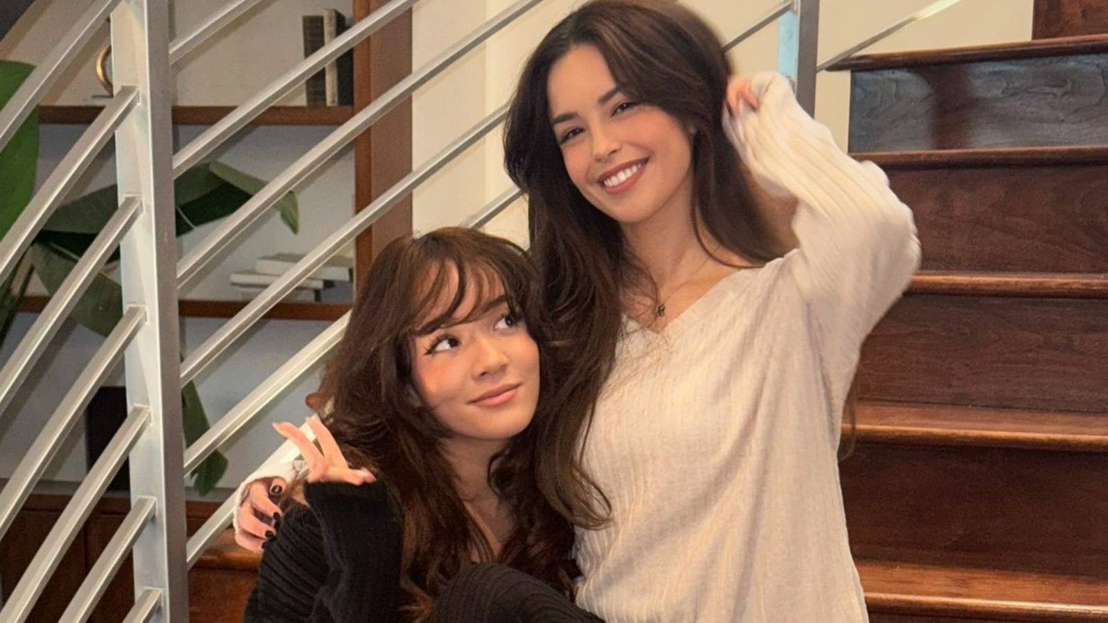 valkyrae and cinna photo on stairs