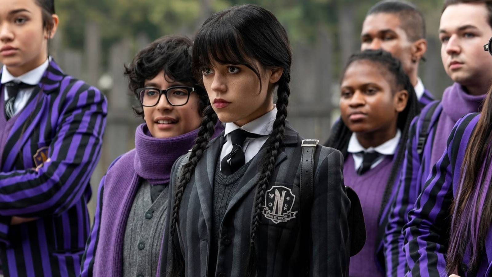 Jenna Ortega as Wednesday Addams with Nevermore Academy students in Wednesday