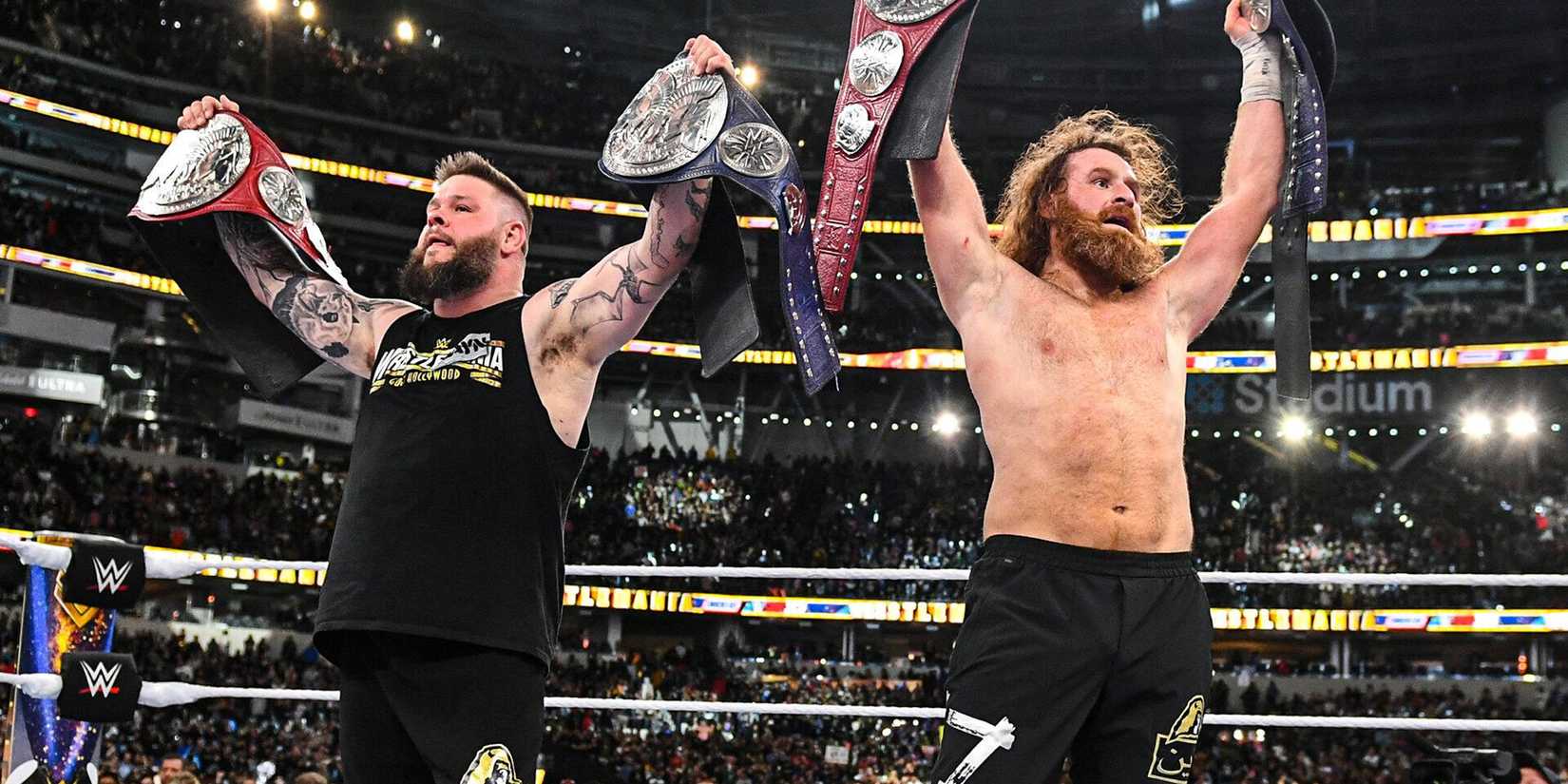 wrestlemania 39 zayn and owens with tag team titles