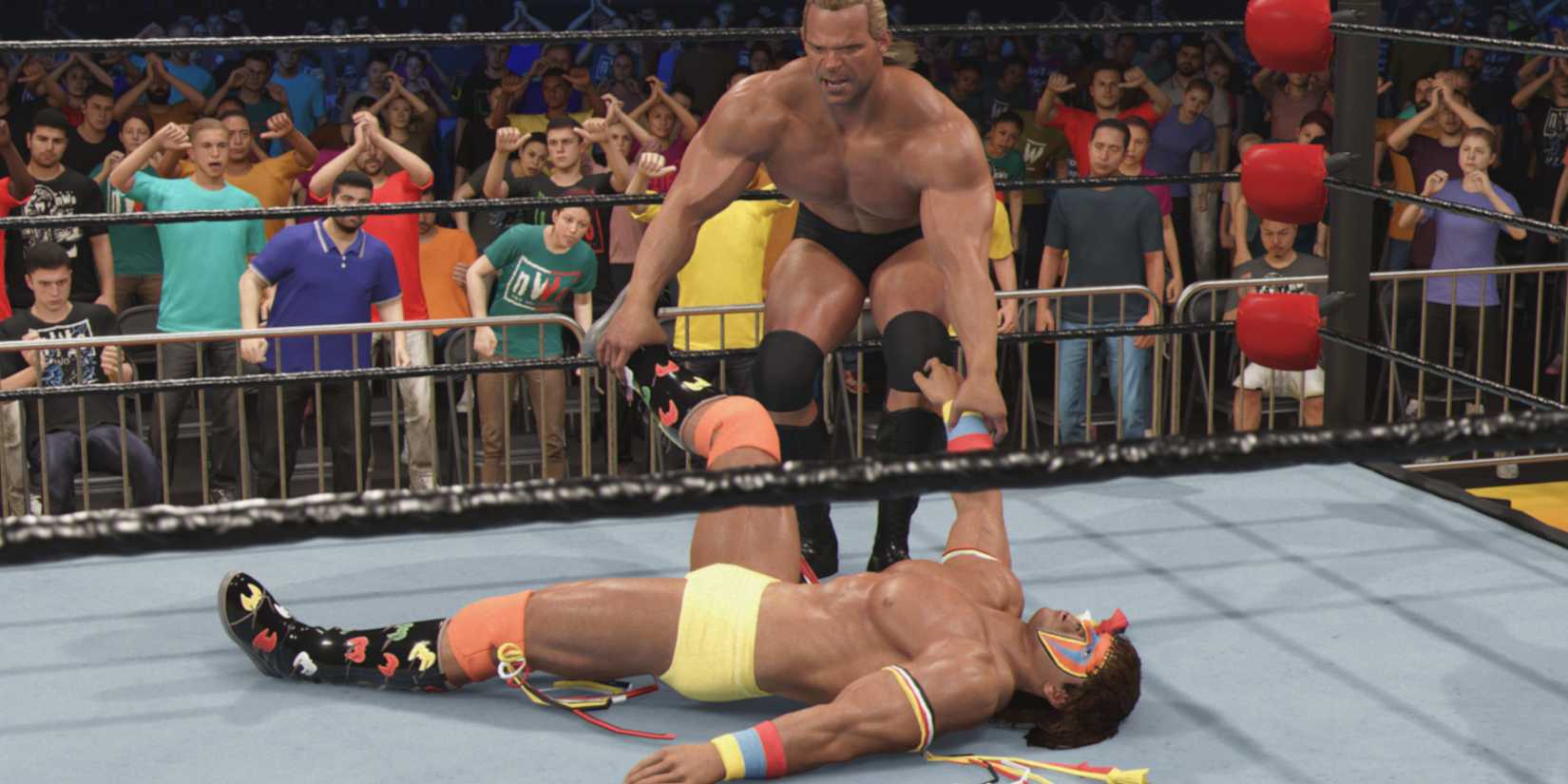 WWE 2K25 Lex Luger dragging a grounded Warriorl