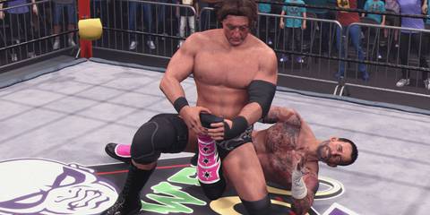 WWE 2K25 William Regal with the leg crank