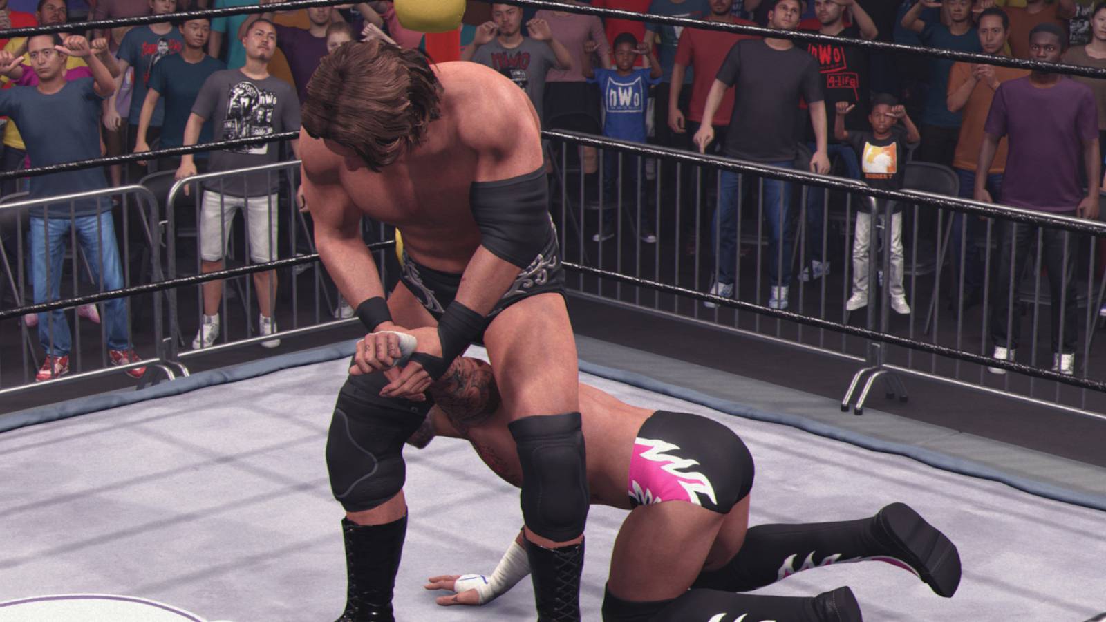 WWE 2K25 William Regal works on Punk's arm