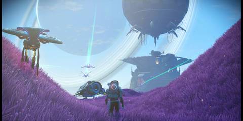 The Player on a Planet With a Ship and Building in the Distance