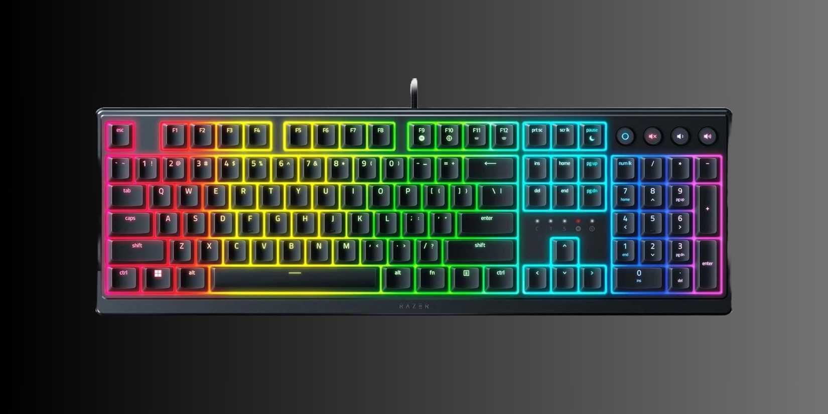 Image of a mecha membrane keyboard on a grey gradient background.