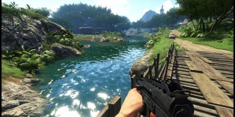 Jason Holding a Submachine Gun And Looking Out Over a Lake in Far Cry 3