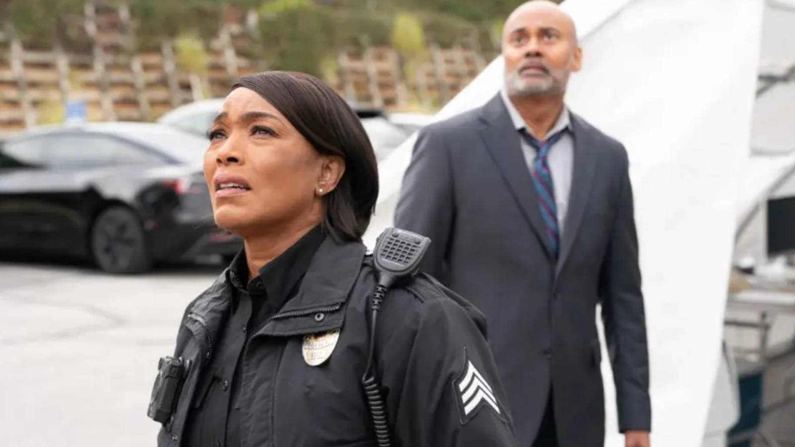Athena Grant (Angela Bassett) and Dr. Francis Banting (Sean T. Krishnan)