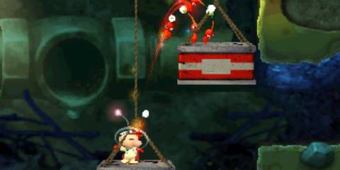 A Key Frame From Hey! Pikmin Showing Olimar Throwing Red Pikmin Up To A Ledge