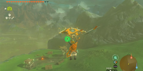 A Key Frame From The Legend Of Zelda Tears Of The Kingdom Showing The Player Gliding Towards An Enemy Encampment
