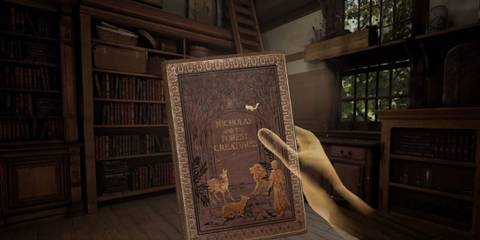 A player holding a book in Deracine (1)