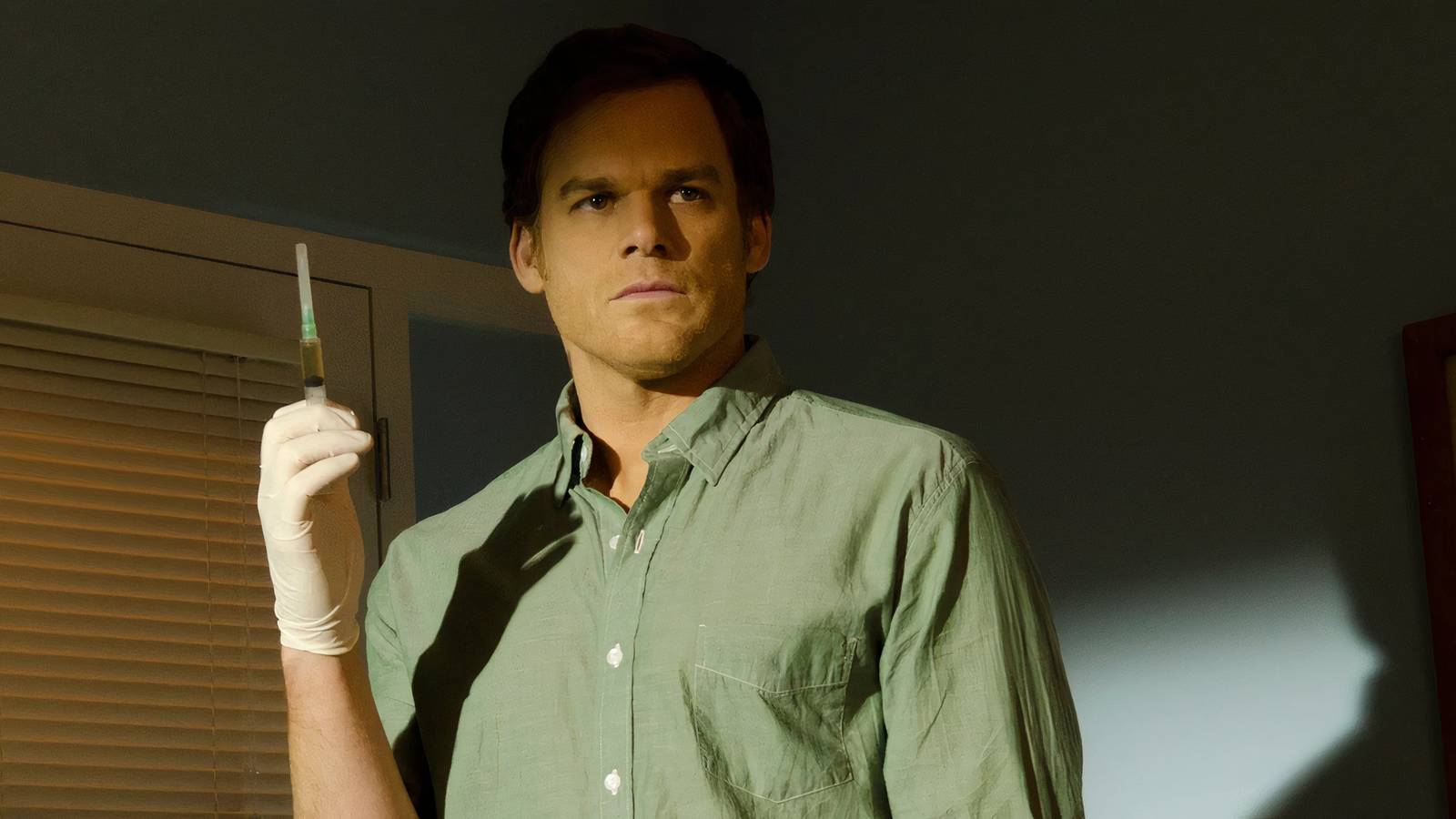 Dexter holding his syringe 