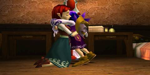 Kafei and Anju hugging each other after getting reunited in The Legend of Zelda Majora's Mask-3