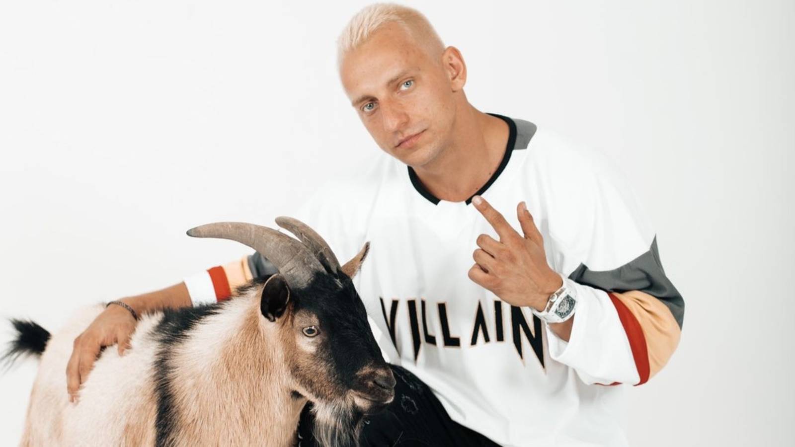 vitaly posing with a goat