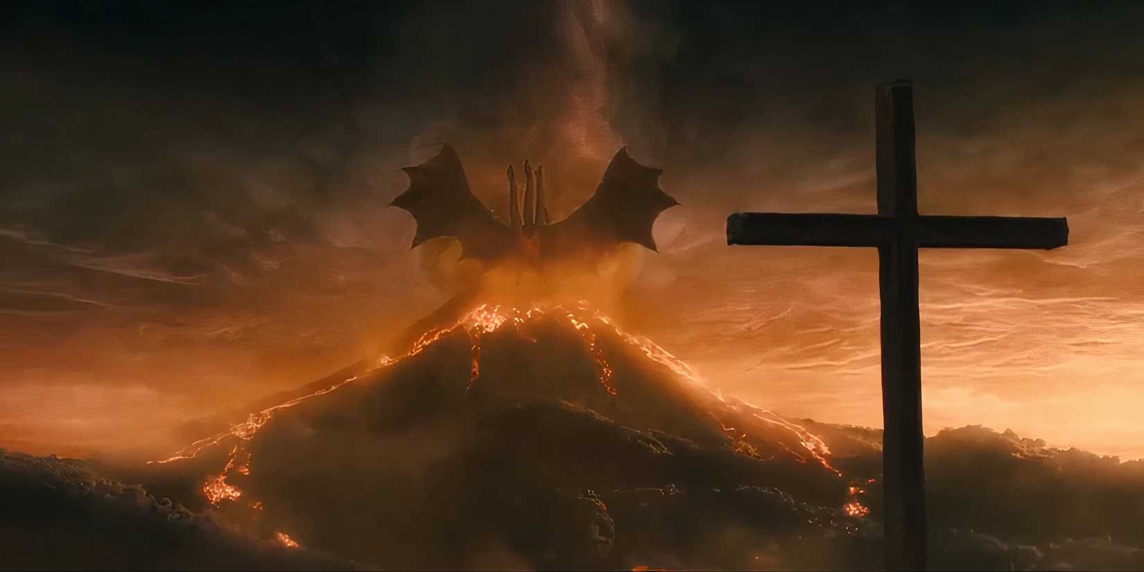 King Ghidorah performs an alpha roar atop a volcano after Godzilla is seemingly defeated in Godzilla: King of Monsters (2019)