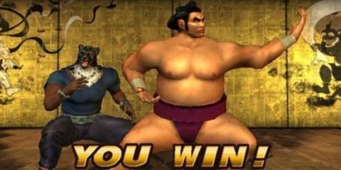 Ganryu (a sumo wrestler) and Armor King (a luchador with a jaguar mask) after winning a match