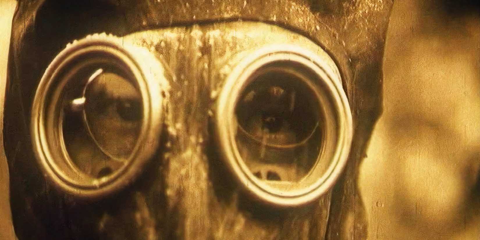 10 Best Post-Apocalyptic Movies of the 80s a man watches from behind a gas mask