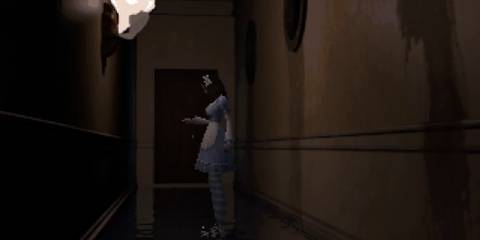 alisa standing in a hallway