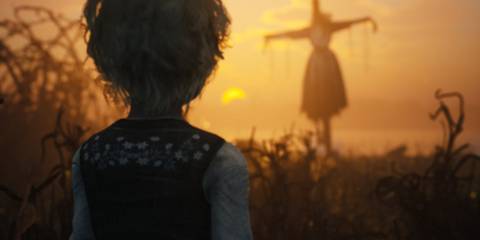 player looking at scarecrow