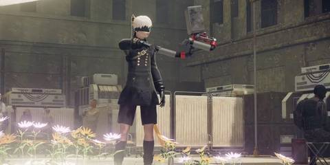 NieR Automata 9S standing in an urban area next to a pod