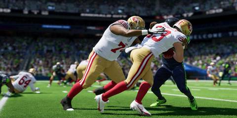 Players tackling each other in Madden NFL 24
