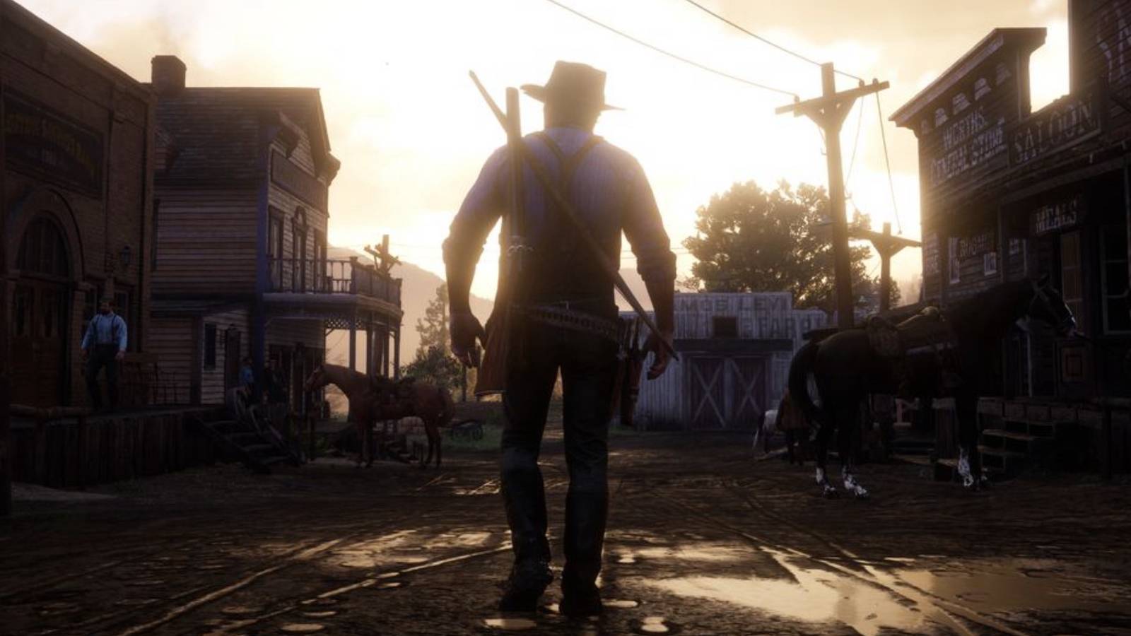 Arthur Morgan walking in front of the Sunset in Red Dead Redemption 2