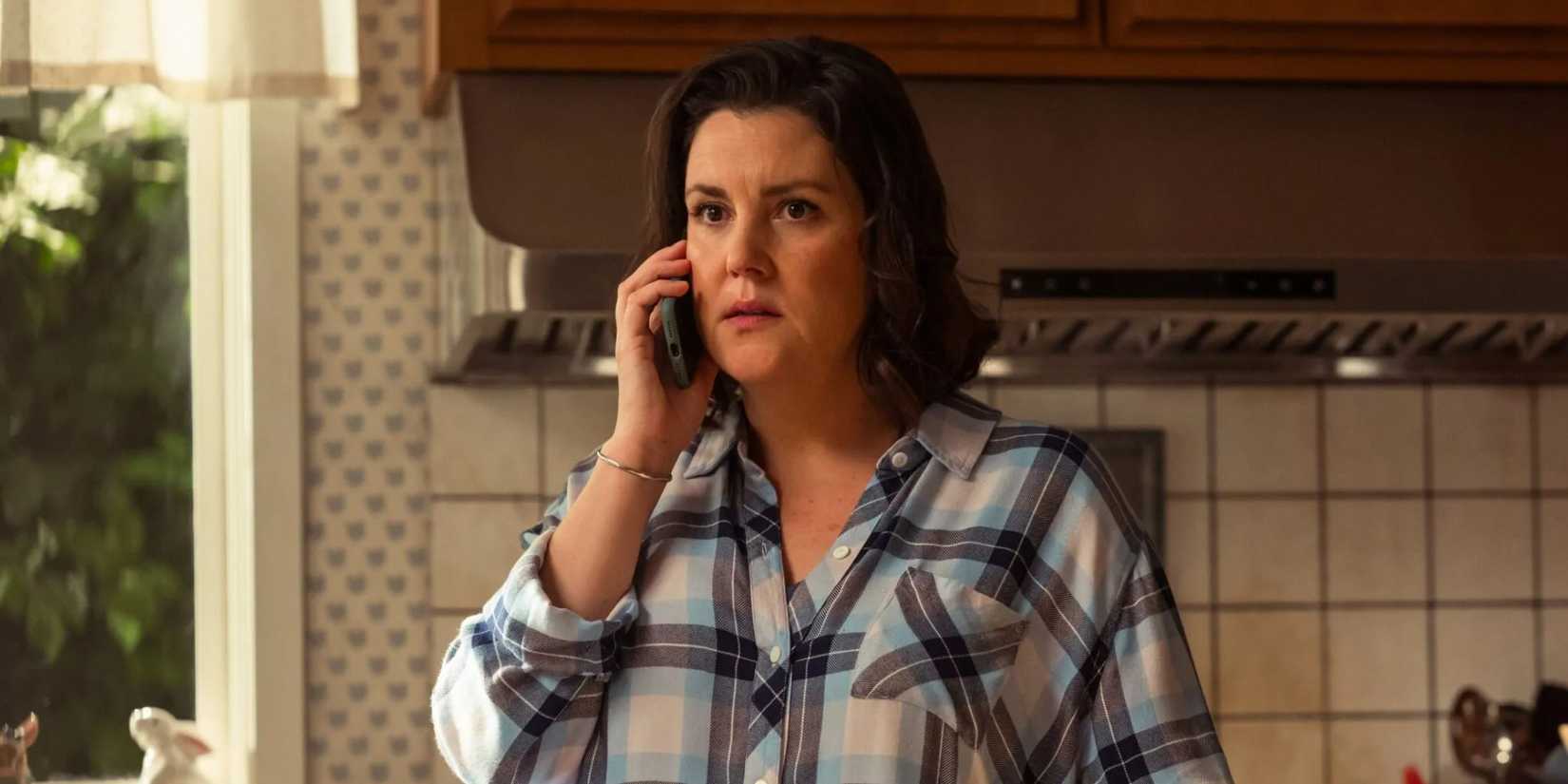 Shauna holding a phone in a scene from Yellowjackets