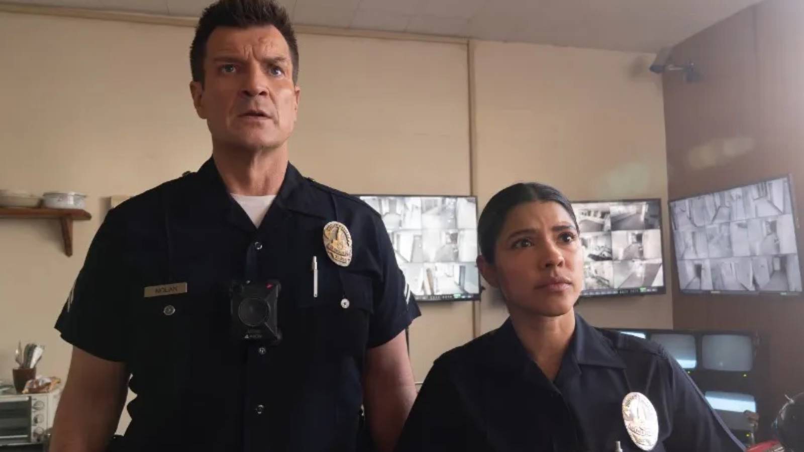John Nolan (Nathan Fillion) and Celina Juarez (Lisseth Chavez) on The Rookie