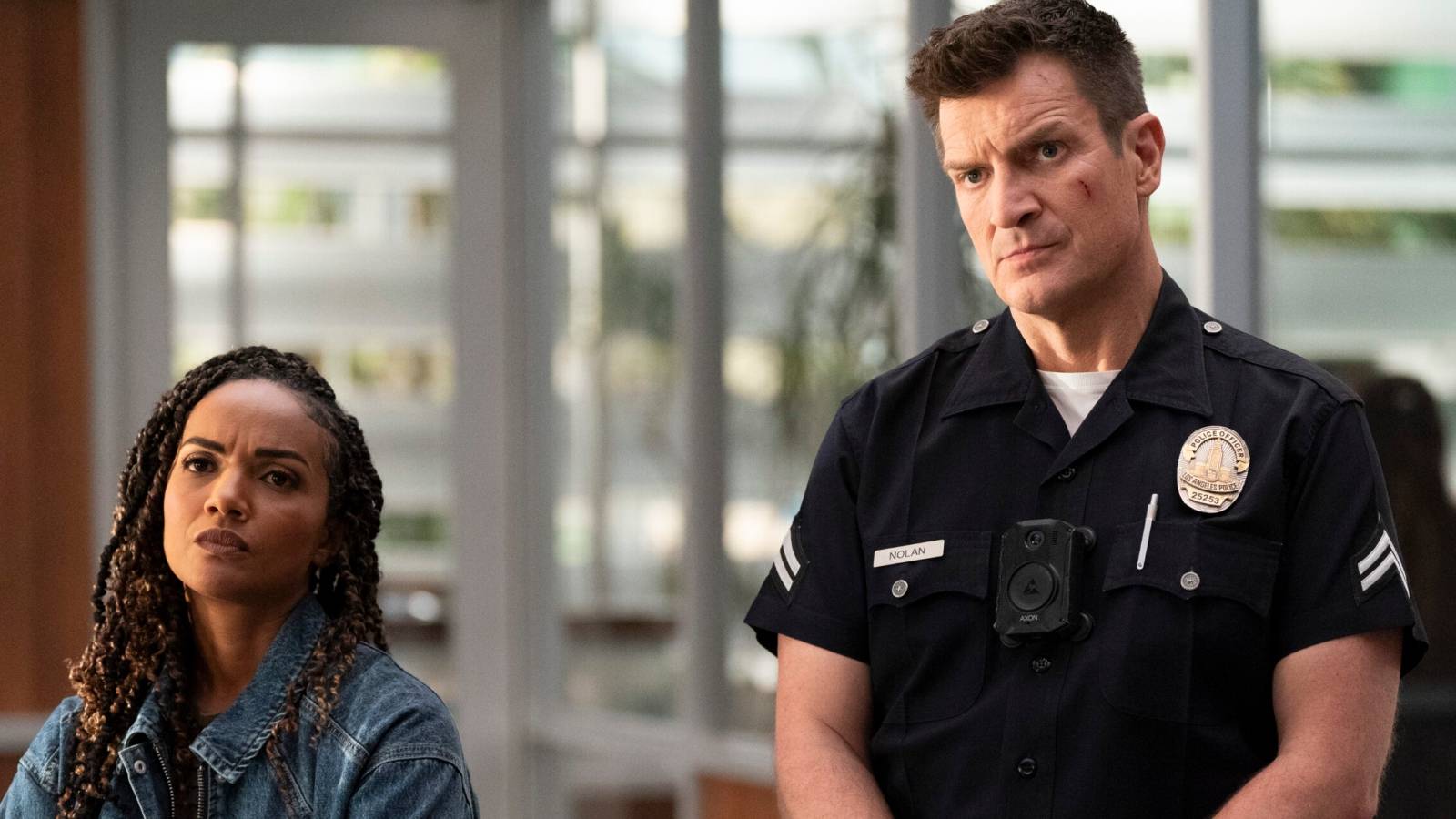 Nyla (Meika Cox) and Nolan (Nathan Fillion) on The Rookie