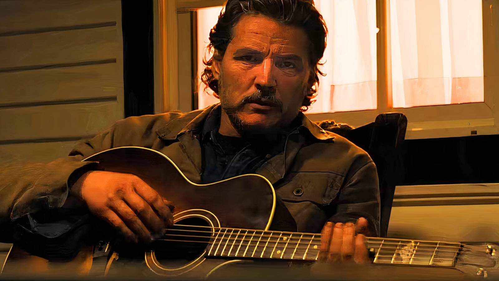 Joel playing guitar in the last of us season 2
