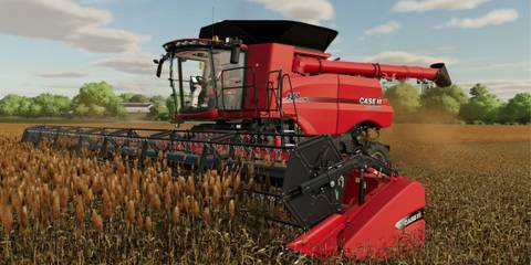 A player harvesting in Farming Simulator 22