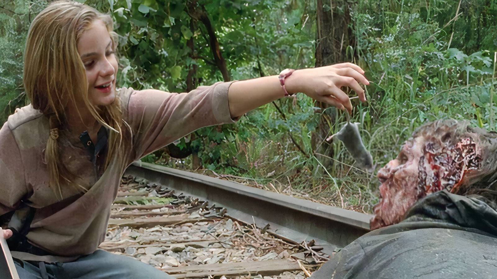 Lizzie feeding a walker a mouse in The Walking Dead