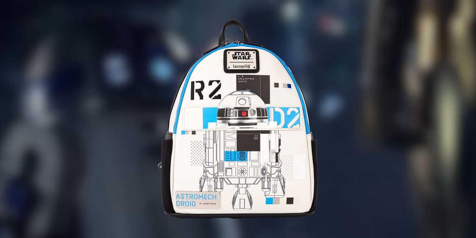 Image of an R2D2 on a background of RD2 and C3PO.