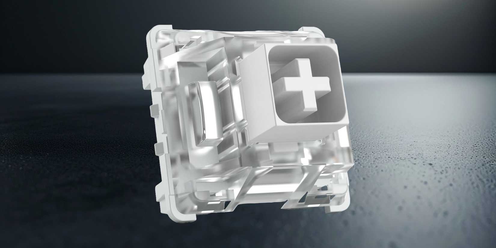 Image of a clicky keyboard switch on the background of a moon. 