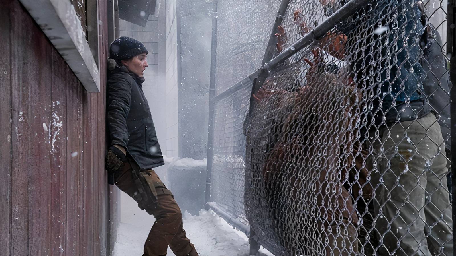 Abby and infected at a fence in The Last of Us Season 2