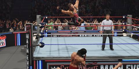 WWE 2K25 RVD Diving attack to the Muta on the outside
