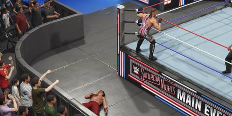 WWE 2K25 RVD prepares the springboard attack to the outside